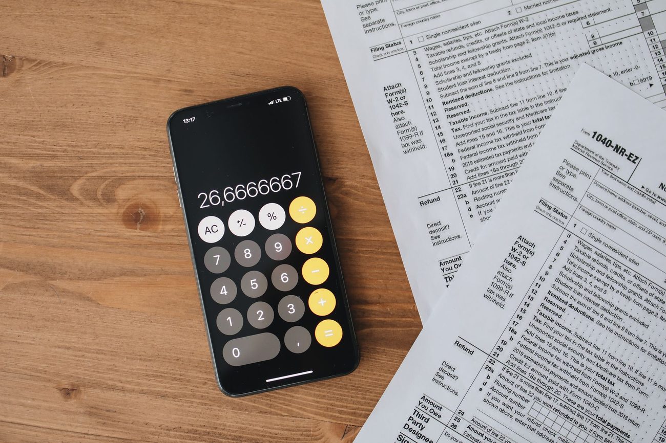 Paying the spousal surcharge or buying my own plan